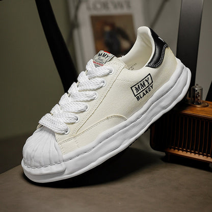 Revised Maison Mihara Yasuhiro Wavy Dissolved Sole Sneakers - MMY Canvas White