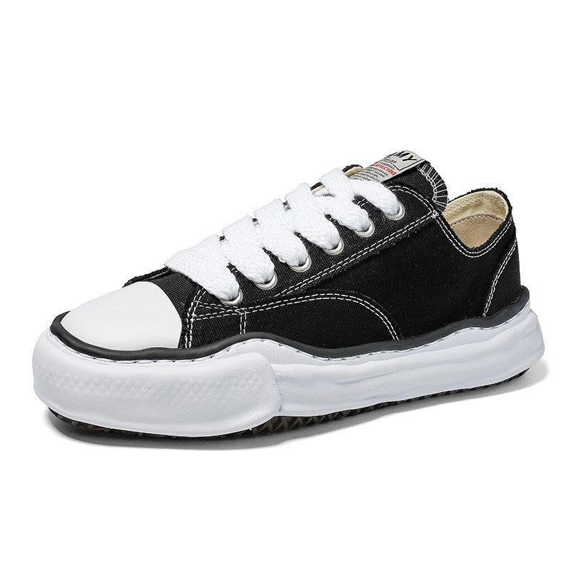 Revised Maison Mihara Yasuhiro Wavy Dissolved Sole Sneakers - MMY Canvas White