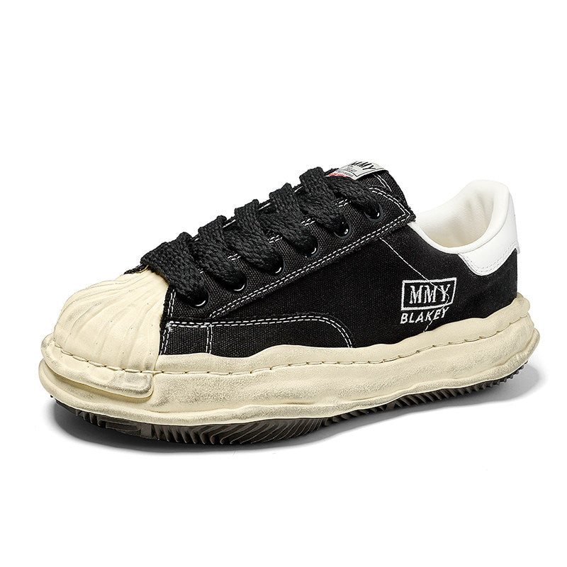Revised Maison Mihara Yasuhiro Wavy Dissolved Sole Sneakers - MMY Canvas White