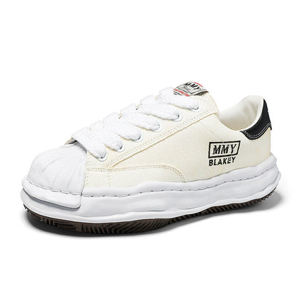 Revised Maison Mihara Yasuhiro Wavy Dissolved Sole Sneakers - MMY Canvas White
