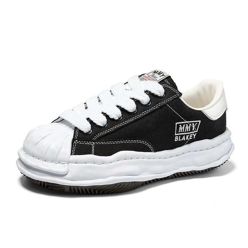 Revised Maison Mihara Yasuhiro Wavy Dissolved Sole Sneakers - MMY Canvas White