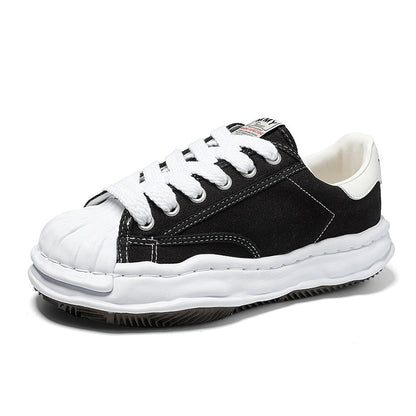 Revised Maison Mihara Yasuhiro Wavy Dissolved Sole Sneakers - MMY Canvas White