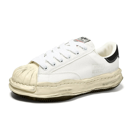 Revised Maison Mihara Yasuhiro Wavy Dissolved Sole Sneakers - MMY Canvas White