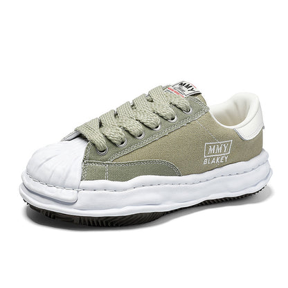 Revised Maison Mihara Yasuhiro Wavy Dissolved Sole Sneakers - MMY Canvas White